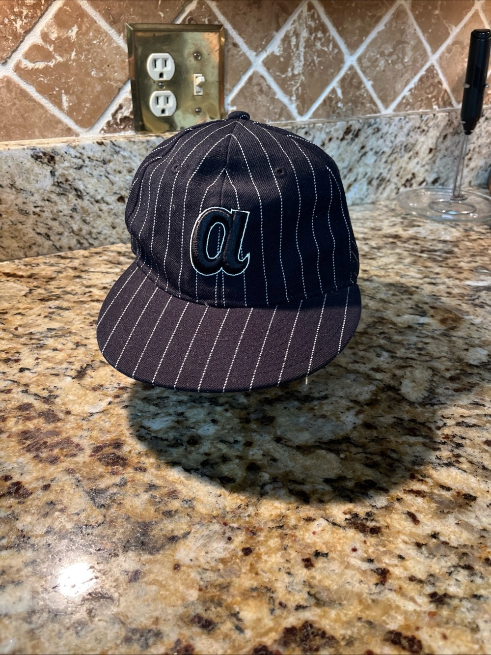 Augusta Sportswear Black Pinstripe Baseball Cap with 'a' Logo